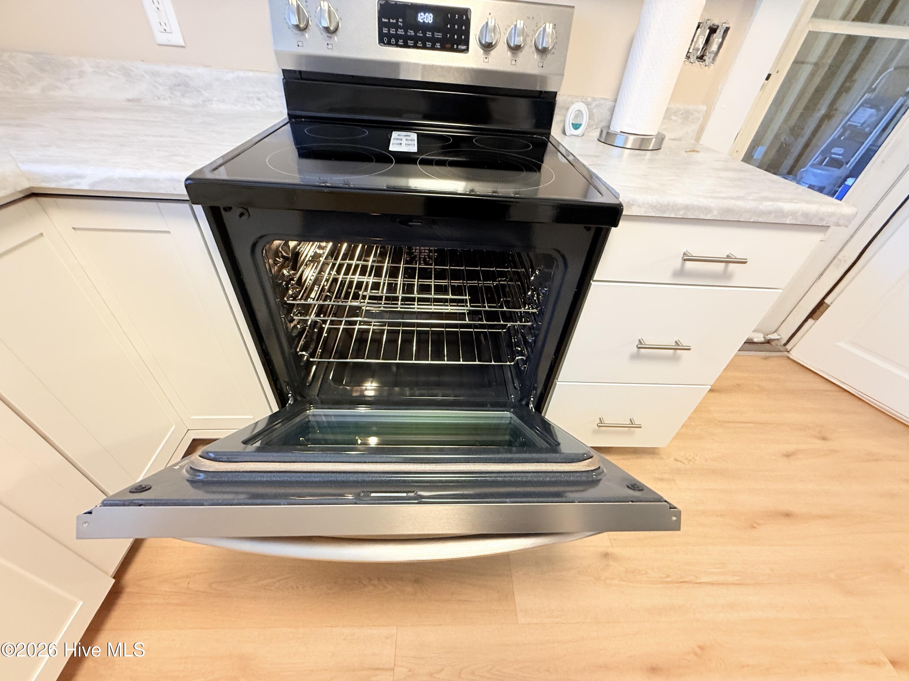 New range and microwave.