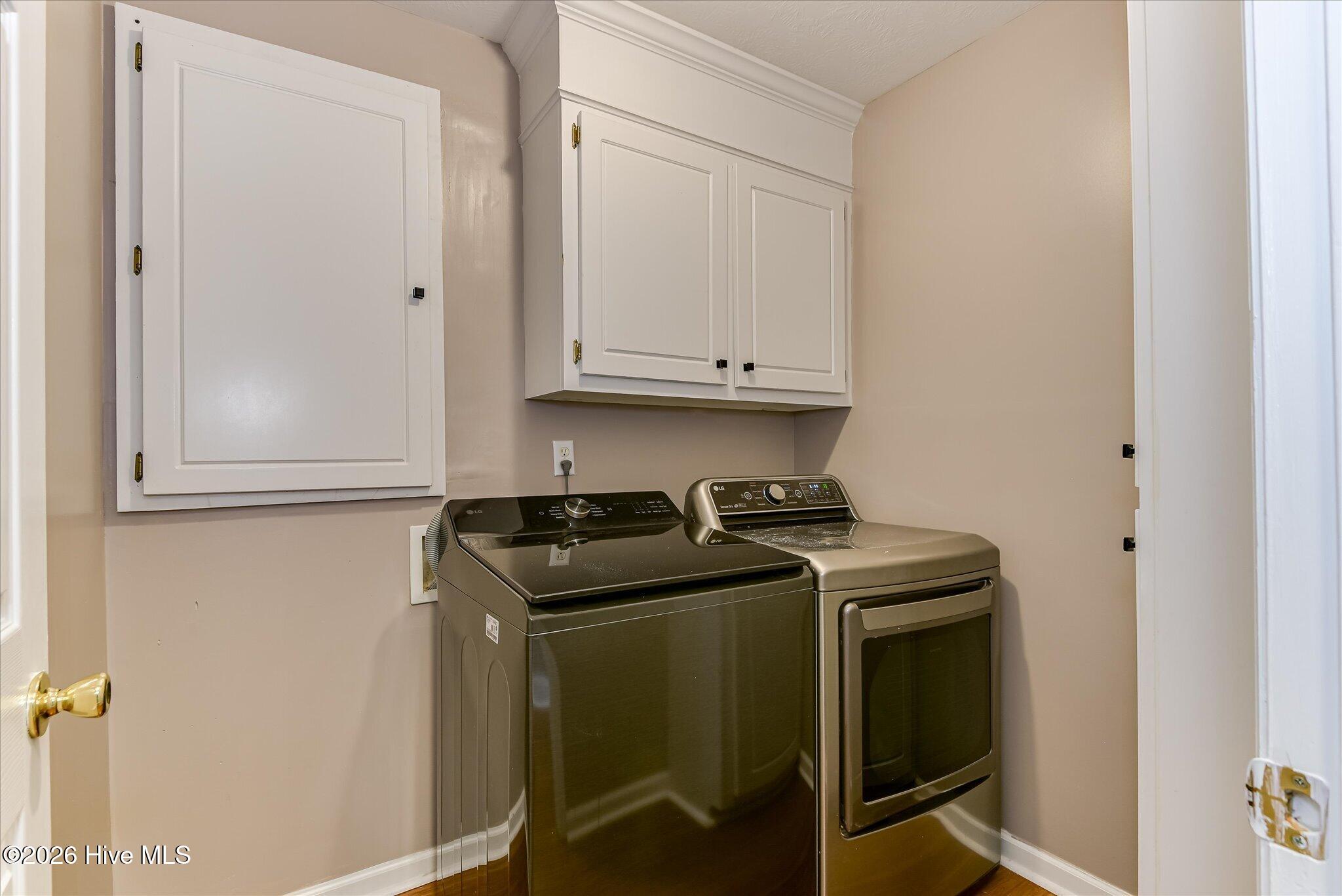 Spacious Laundry with plenty of space for folding and even room for a sink