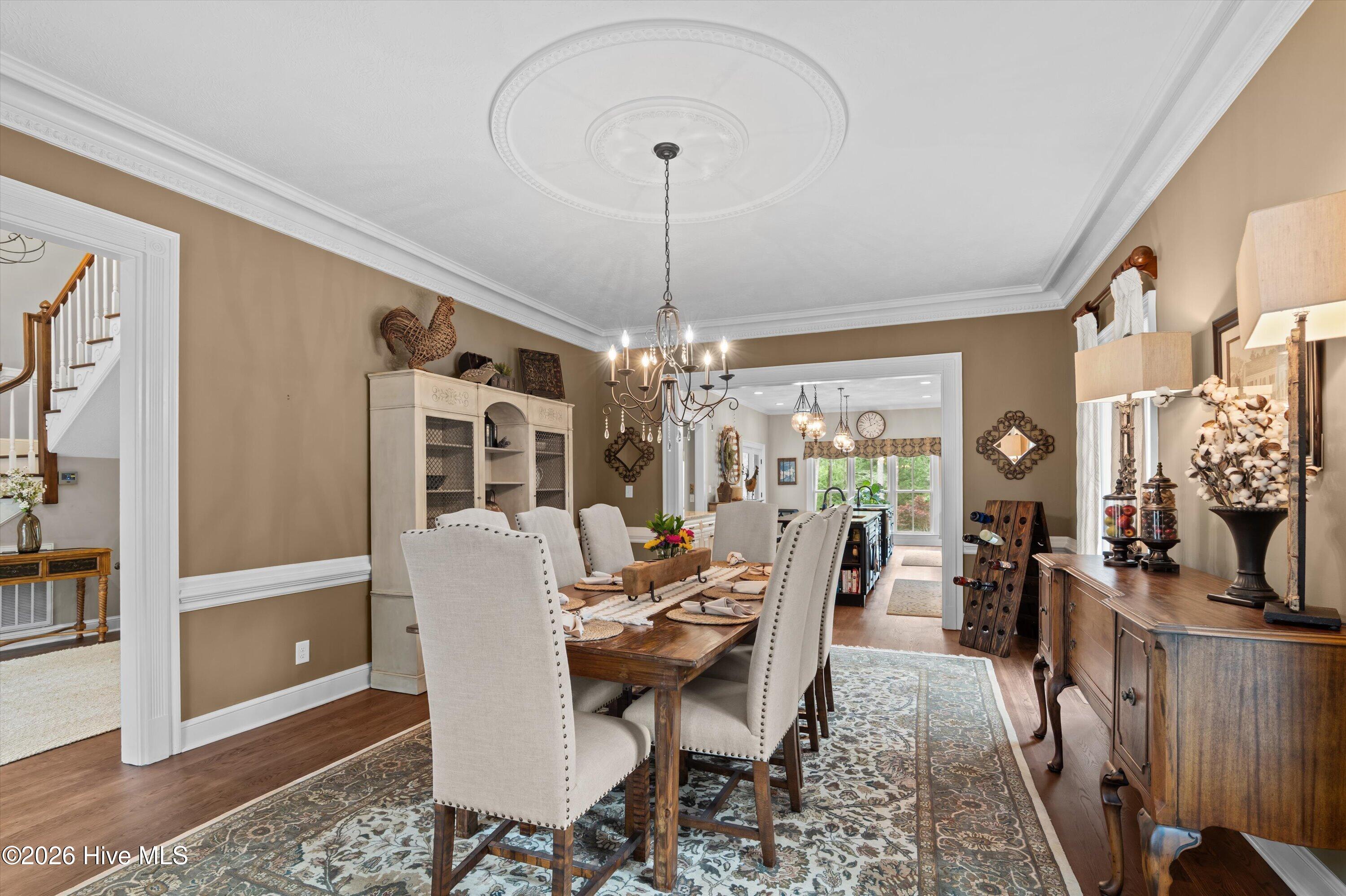 Formal dining off of foyer opens to kitchen