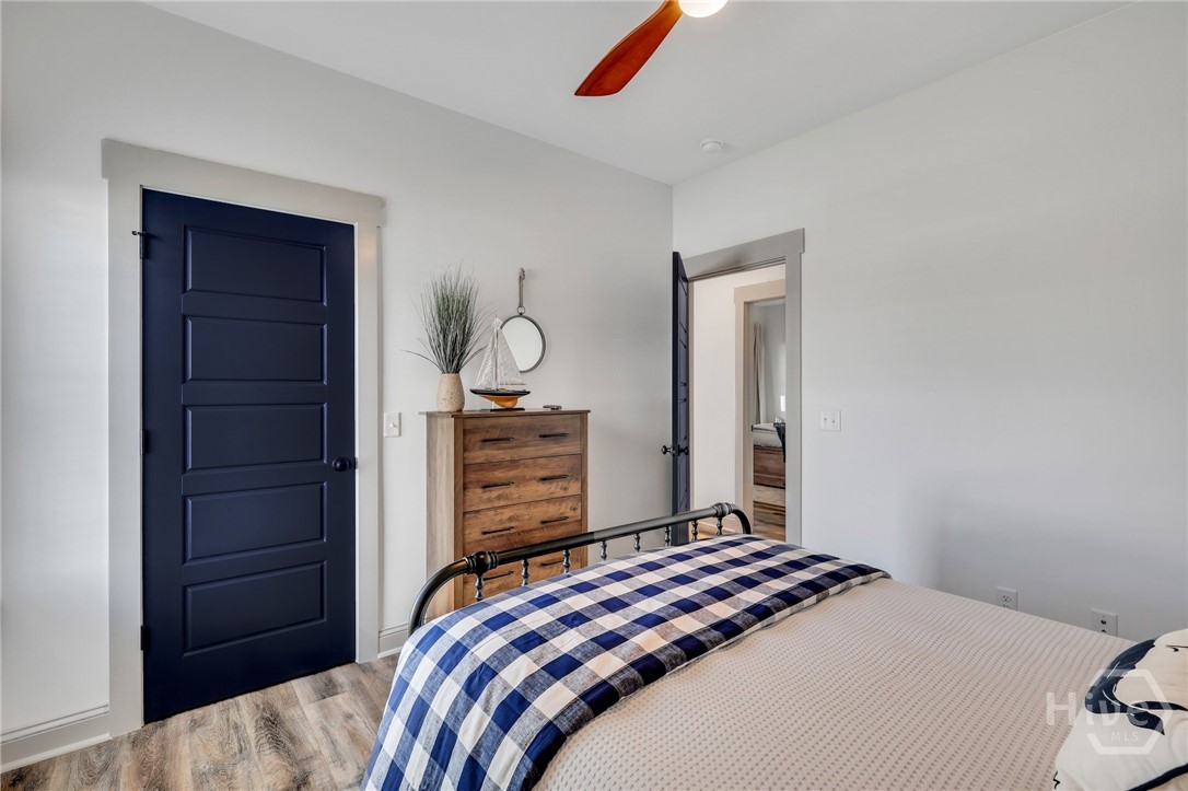 PHOTOS OF A PREVIOUSLY BUILT BRINSON PLAN BY LAWRENCE ALEXANDER HOMES.