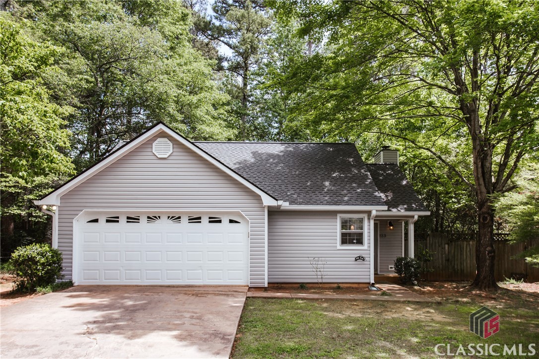 Amazing find in the East side of Athens! This three bedroom, two bath house is located in one of Athens most convenient neighborhoods. Well distributed, with every square inch perfectly used, you will find that this house feels spacious and well organized. The living room has gorgeous vaulted ceilings, a lovely wood-burning fireplace and laminate floors throughout. The adjacent eat-in kitchen has an open feel with white cabinetry and an area for a dining table. The main bedroom is large and bright, with trey ceilings and a comfortably sized ensuite bathroom. Last but not least, a freshly stained deck is right off the living room, bringing you into the private, fenced-in backyard, perfect to enjoy with friends and family. New roof, new siding, new gutters, a new deck & freshly painted exterior- this house is in move-in ready condition and perfect for an owner occupant or an investor.
