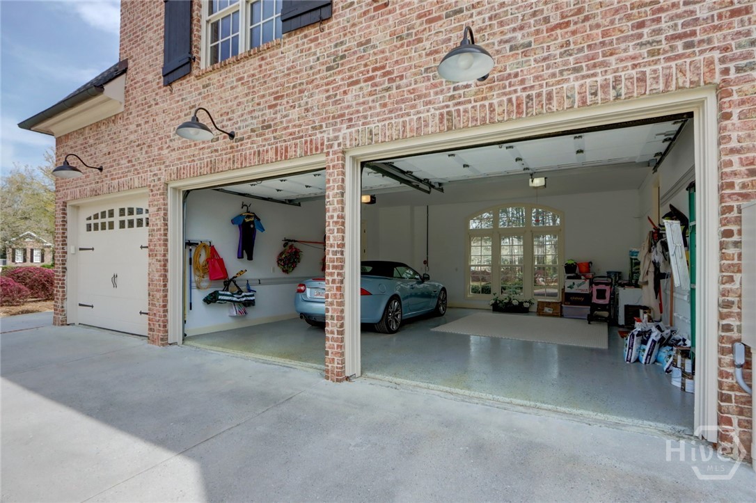 3 Car garage or 2 Car / 1 Golf Cart garage.