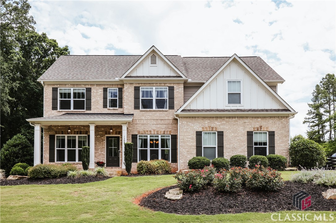 This is arguably one of the most move-in ready homes on the market. In just the past year, the owners completey painted the interior, put in all new hypoallergenic carpet upstairs, upgraded bathrooms, lighting, and landscaping. You'll know from the moment you arrive to the corner lot and see the perfectly manicured lawn and planting beds that you are in for a treat. You enter the home from a covered front porch into a foyer with a formal living room and dining room on each side with upgraded trim. Across the rear of the home is a two-story light and bright great room with fireplace and internally wired and mounted TV that opens up to the kitchen. The eat-in kitchen has a center island with new pendant lighting, granite countertops, a gas cooktop, and double ovens. Off the kitchen is a precious patio with a private fenced-in yard. There is a bedroom and full bathroom on the main level. Upstairs are four additional bedrooms, including the large owner's suite with beautiful bathroom and oversized closet that opens to the laundry room for convenience. One bedroom has a private completely renovated bathroom, and two more share a hall access bathroom with new tile. The upstairs is nice and open to the living room below. Pebble Creek subdivision is a social neighborhood with neighborhood pool and sidewalks, and it's out of the high traffic area, but only 3.5 miles to downtown Watkinsville, 3 miles to Wire Park, and zoned for the sweet Colham Ferry Elementary School.