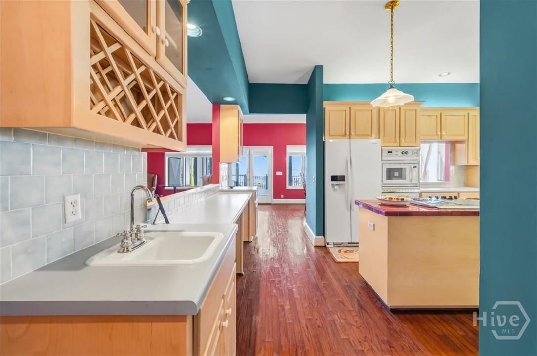Kitchen with wet bar and additional counter space