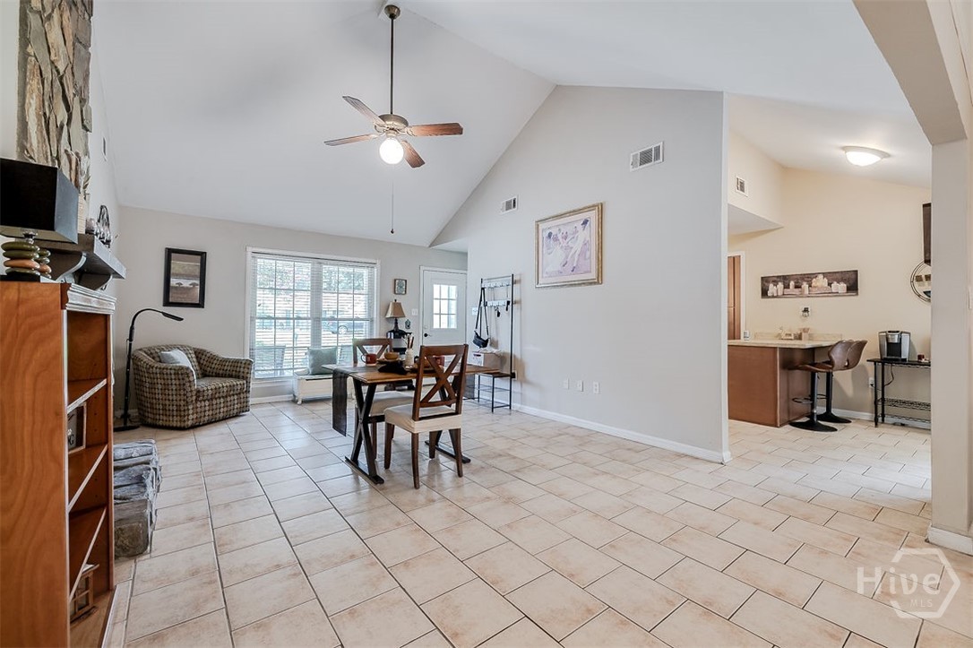 This space is 19'10 X 13,5 is currently used as dining area, but it can be whatever works best for you, and open access to the kitchen