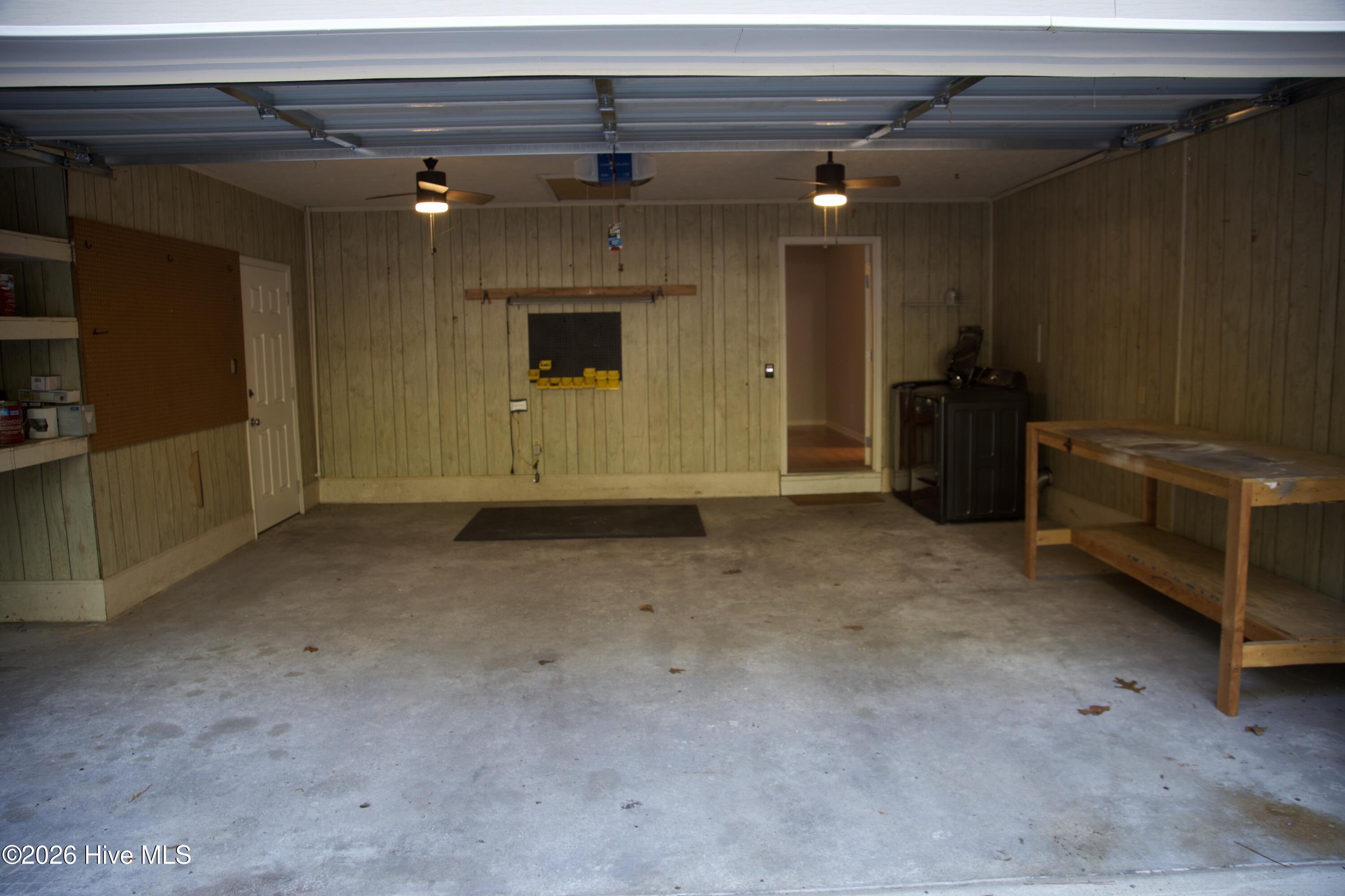 2 Car Garage with Storage on side and pull down stairs to the garage attic.