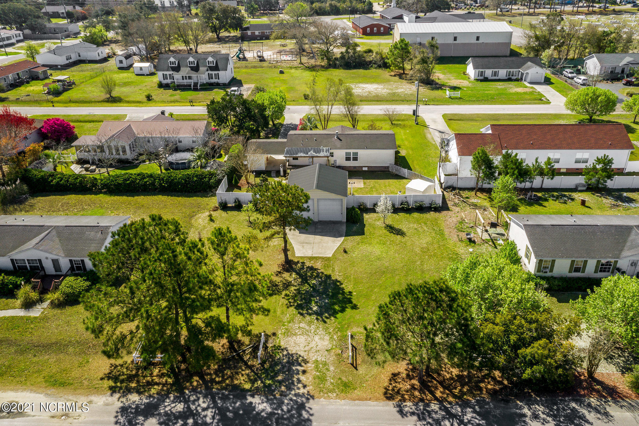 Birds eye view of property from rear