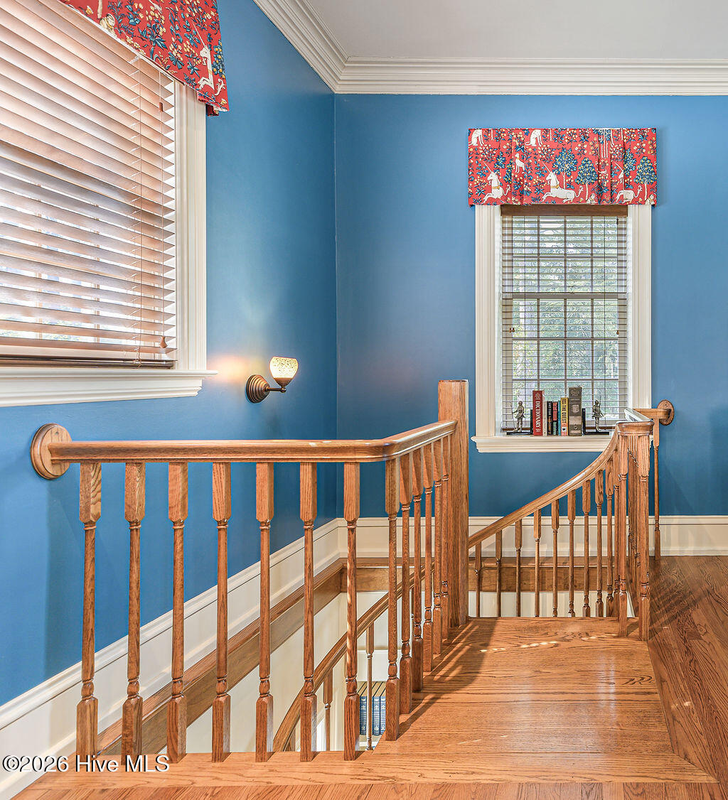 Landing to spiral staircase leading to sitting room below.