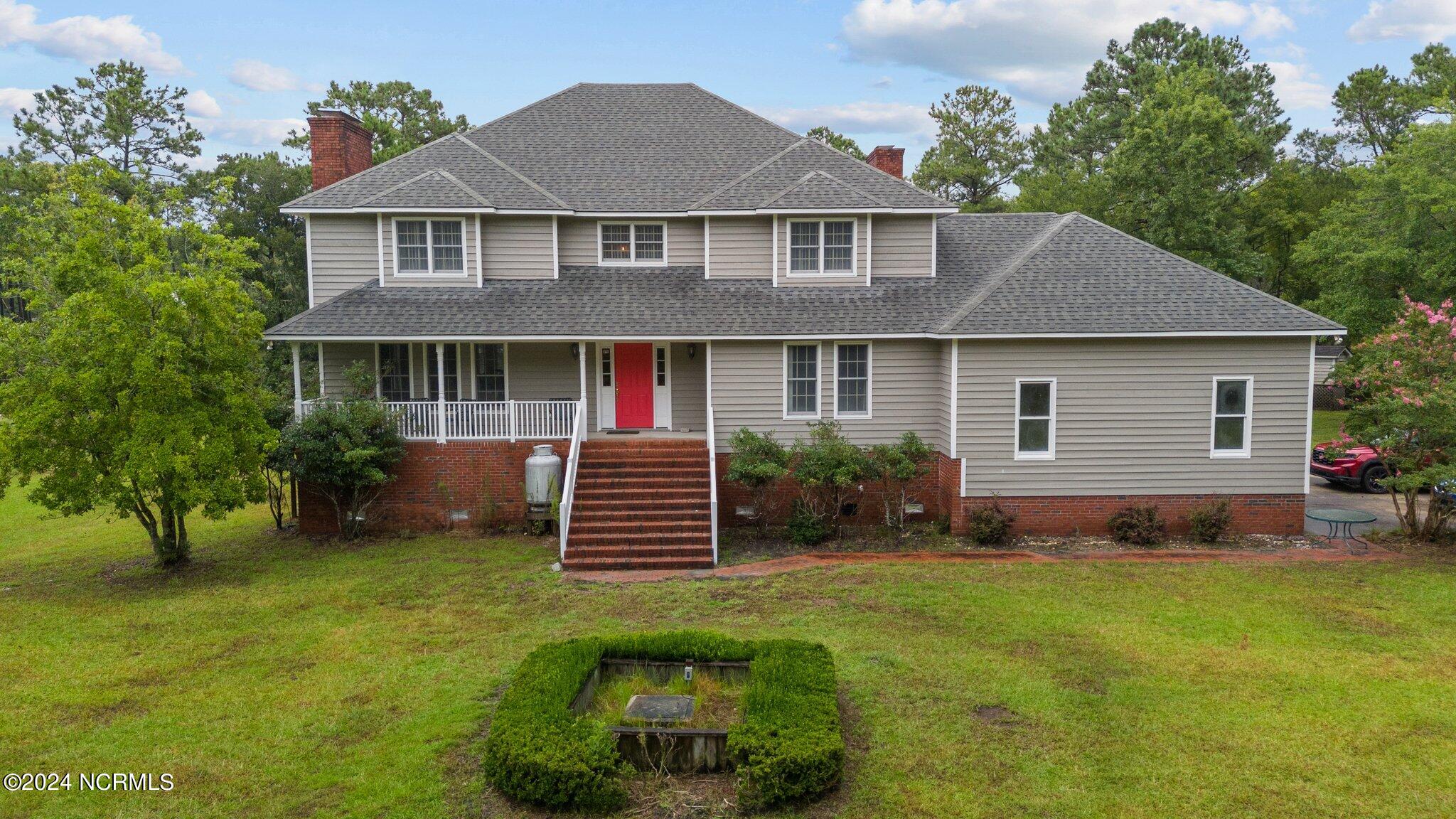 1039 Pasture Point Road Merritt, North Carolina WATERFRONT RESIDENCE WITH ACREAGE!
Here's the waterfront dream w/hundreds of feet of water frontage & represents the perfect combination of location, scale, design and waterfront quality to appeal to anyone seeking a unique value. Situated at the end of a long driveway and enjoying the privacy only possible with 10+ acres of land, you'll be impressed by the large (Approx. 3780 HSF) home perfectly positioned to command this compelling location and enjoy the splendid waterviews up, down, across and out tranquil Pasture Creek to the boundless wide waters of the Bay River beyond!!! The residence is a genteel design, both formal and comfortable in equal measure. As you enter from the front porch into the reception foyer the home welcomes you with a gorgeously- curved staircase ahead and a bedroom (or office/parlor) to the right and a large formal living room to the left (w/fireplace). The living room opens gracefully into the spacious dining room with sunny waterviews. The huge country kitchen is a gourmet dream and features lots of counter space, a breakfast area and access to the large screened porch and deck overlooking the water! A large cozy Family room adjoins with another fireplace and access to the waterside deck. A large utility room completes the scene, with direct access to the garage and walk-up attic! The 2nd floor is given over to luxurious private living with a sitting loft, two very big bedrooms (w/shared bath) and the huge master suite wing!!! The master bedroom is a world unto itself, entered through double doors and with tremendous space and flexibility... A personal fireplace, dressing area, exercise nook and private deck! So much to appreciate and priced below appraised value to reflect the various updating/improving that you might want to give it your personal touches! Hundreds of feet of waterfrontage, 10+ acres of grounds and woodlands, and so much natural beauty to appreciate! A perfect waterfront location, with a great pier, too!