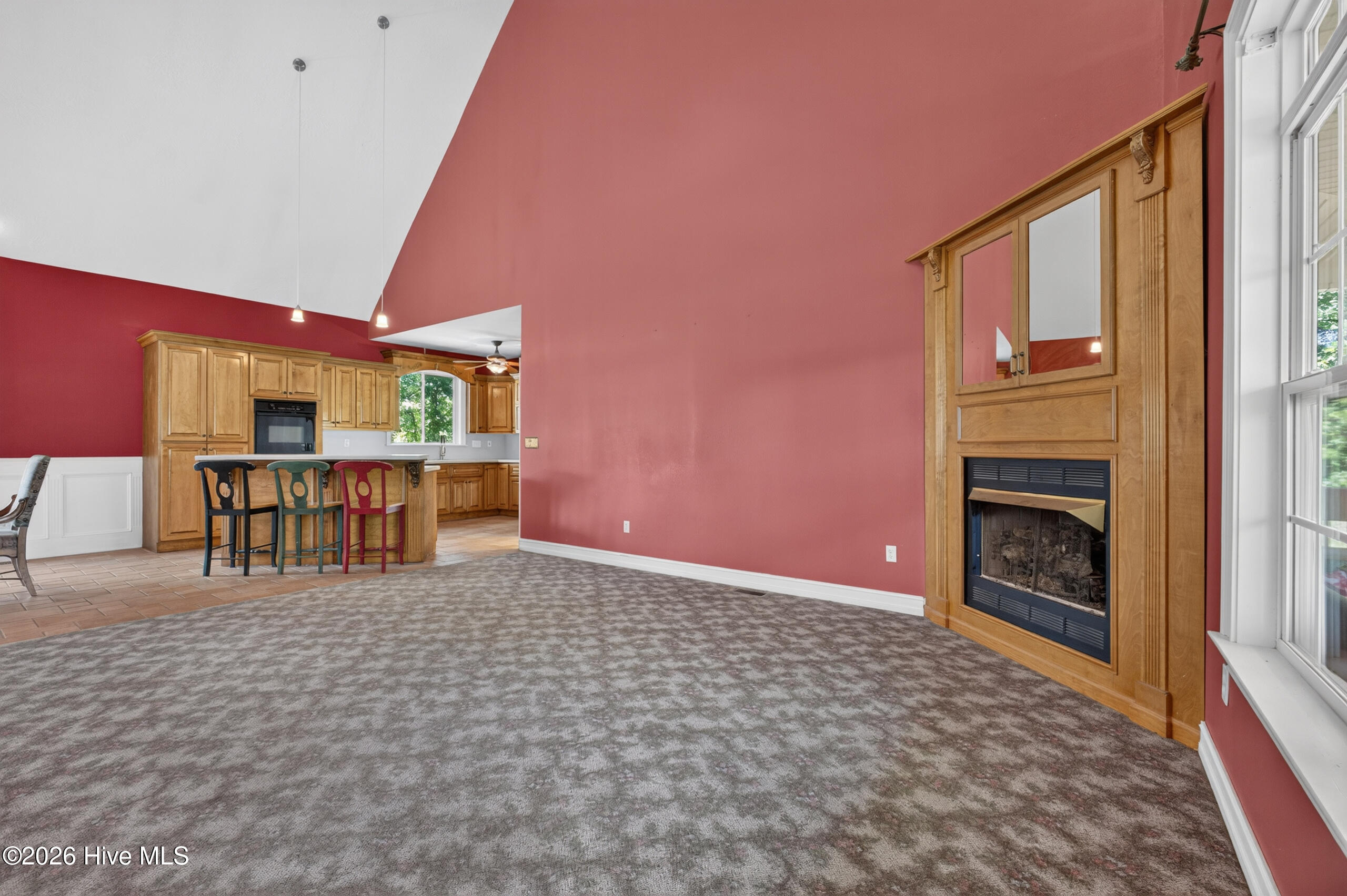 open floor plan, Great Room + Dining Room with ample-sized Kitchen