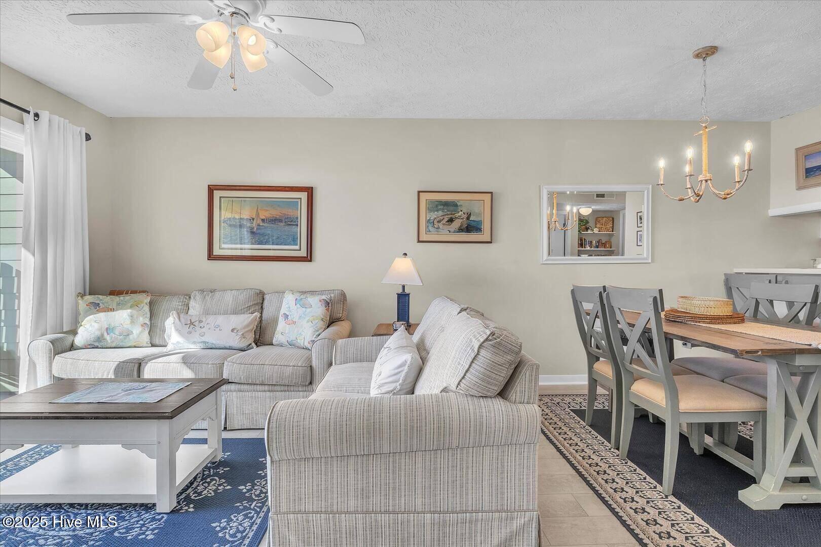 1000 Caswell Beach Road, Oak Island, NC 28465 – photo 16: 1000 Caswell Beach Road 1303 Living Room