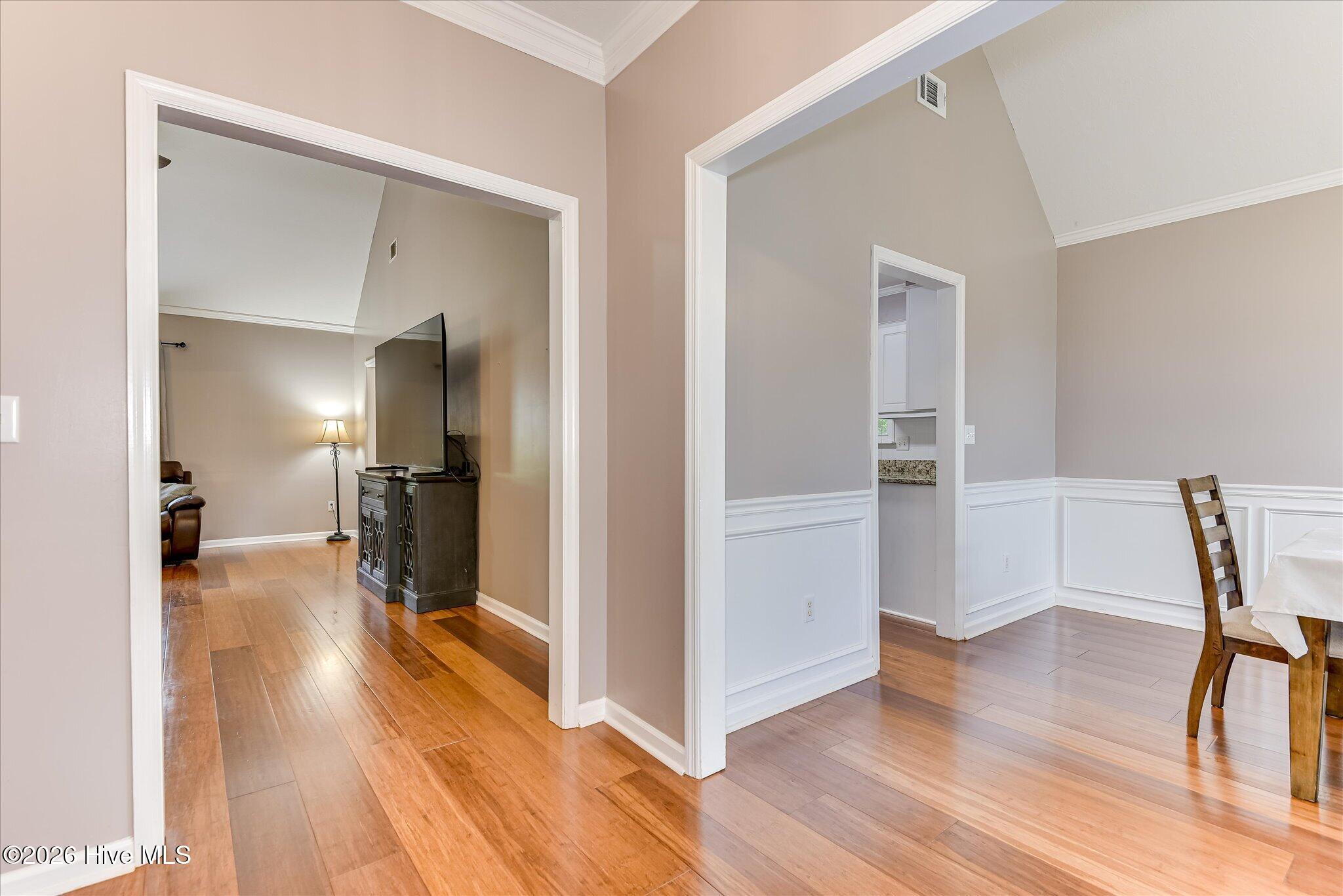 Gorgeous wood floors throughout- Entry leads to Formal Dining and Family Room