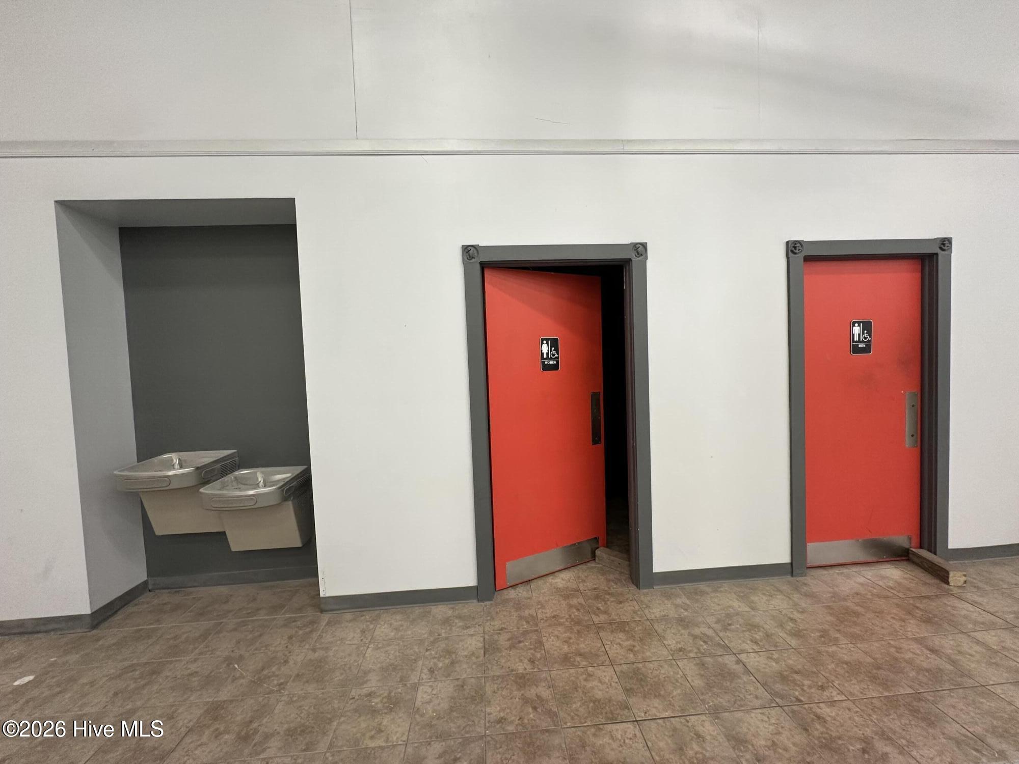 Rear men and women's bathrooms