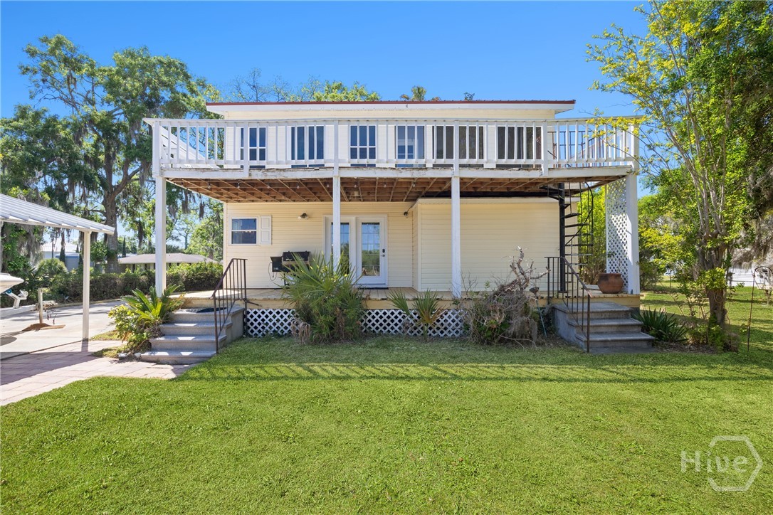 Elevated coastal home with spacious upper deck, co