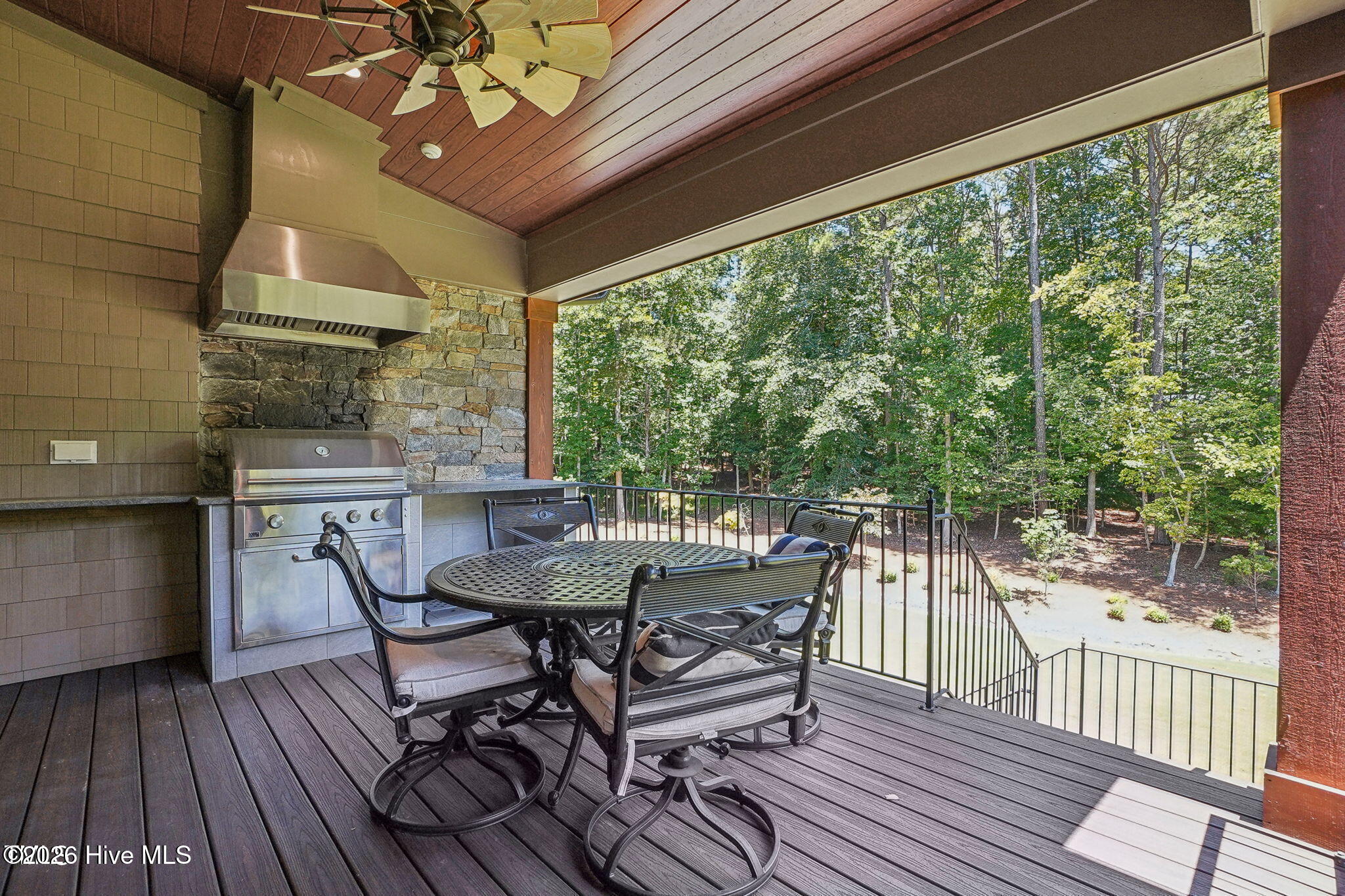 Back wall of screen porch has retractable phantom executive screen that retracts into the ceiling wh