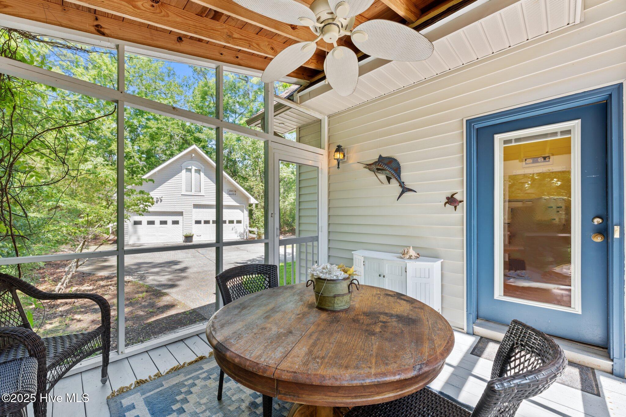 Private screen back porch for enjoying early morning coffee.