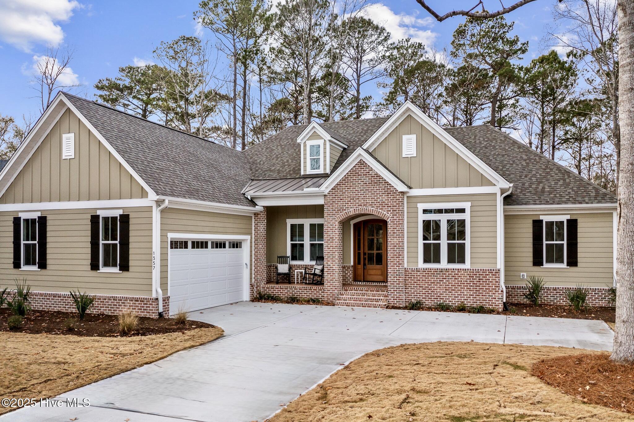 Home is completed! Welcome to this stunning 4-bedroom, 3 full bath Coleman Fine Home nestled in the prestigious community of Winding River Plantation. This beautifully designed residence offers a spacious, open-concept floor plan with high-end finishes, custom millwork, and an abundance of natural light throughout. The gourmet kitchen features granite countertops, stainless steel appliances, and a large island perfect for entertaining. The expansive living area flows effortlessly into a serene sunroom, ideal for enjoying coastal breezes year-round.The luxurious primary suite includes a spa-inspired ensuite bath with dual vanities, walk-in shower, and generous walk-in closet. Three additional bedrooms and two more full baths provide plenty of space for family, guests. Don't forget the office/reading room.Winding River Plantation is coastal Carolina living at its finest, with resort-style amenities including a community fitness facility, clubhouse, pool, tennis and pickleball courts, and miles of walking and biking trails. Boating enthusiasts will appreciate the community marina, private marina, and day docks along the Intracoastal Waterway. Relax at the exclusive oceanfront Beach Club on Holden Beach, just a short walk or bike ride away from the day docks, featuring private parking, beach access, and indoor/outdoor lounge areas.This home is perfect for those who desire luxury, privacy, and access to top-tier amenities in a vibrant, coastal setting. Don't miss your opportunity to live in one of Brunswick County's most desirable communities—schedule your private tour today!Photos updated December 18th