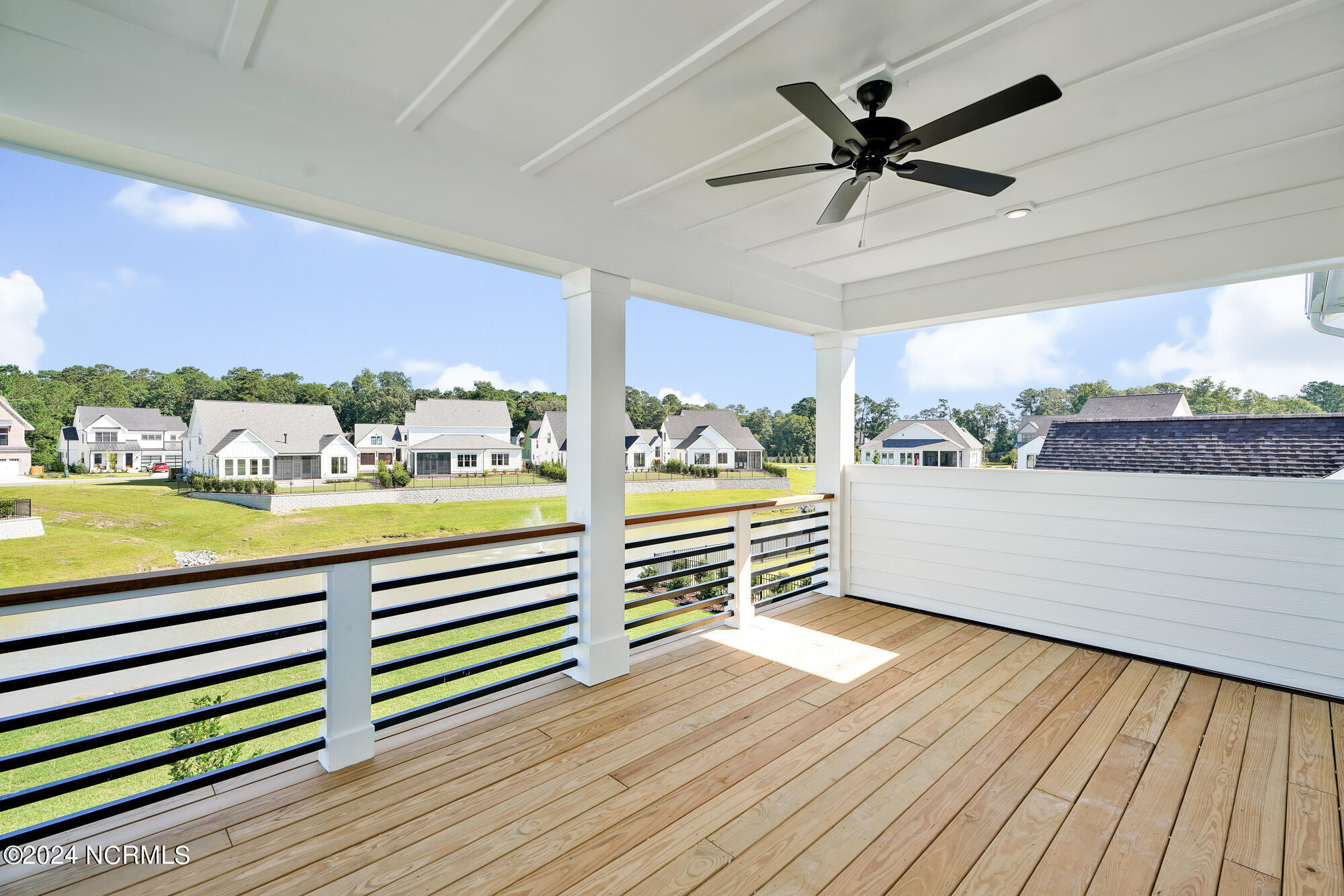 Private porch view of pond from upstairs primary ensuite