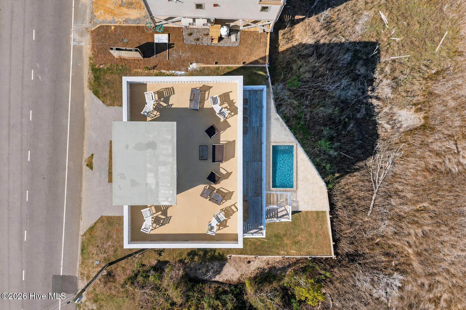 Option to add Plunge Pool and Travertine Patio with acceptable offer. AI generated image of pool.