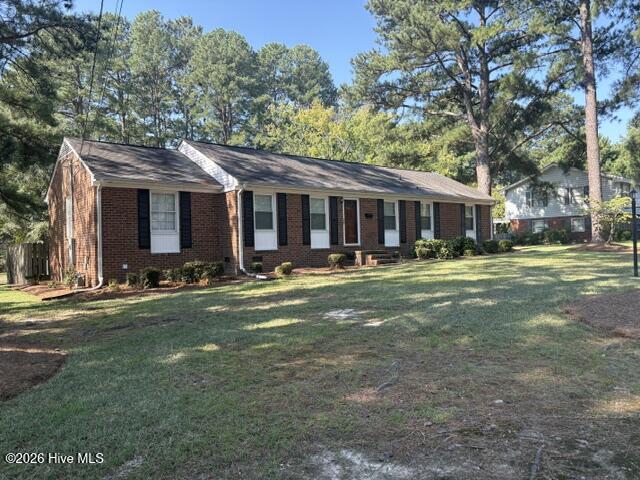Come home to 3001 Ridgecrest Drive! Enjoy the convenience of one level living in this 3 bedroom brick home. An abundance of solid wood cabinets and work island in kitchen will be appreciated by the family chef- space to gather or dine adjoins kitchen too  Hardwood floors in living rooms and bedrooms - fresh neutral paint throughout. This floor plan provides a second living room that can be a home office, play room, school room etc. Spacious laundry room has a seperate utility/furnace closet that keeps everything neat and organized  Lots of concrete parking and fenced area in backyard with storage shed.