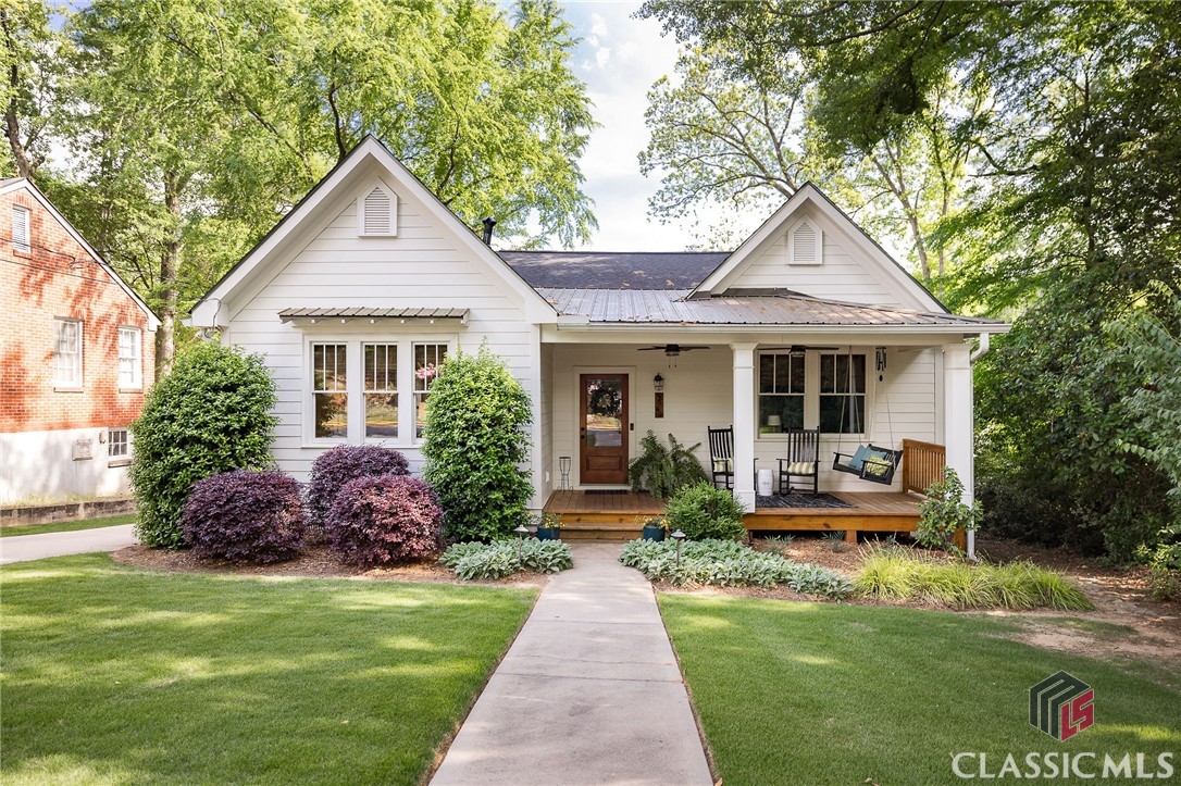 Welcome to your dream home in the heart of Five Points, Athens! This stunning residence has been completely rebuilt to offer modern luxury living combined with timeless charm. Situated in one of Athens' most coveted neighborhoods, this home boasts convenience with its proximity to UGA, hospitals, and an array of dining and shopping options.Step inside and be greeted by an open-concept layout that seamlessly blends functionality with elegance. All four bedrooms are conveniently located on one level, providing both comfort and convenience for effortless living.No detail has been spared in the renovation of this home, with high-end finishes throughout that exude sophistication and style. From the gleaming hardwood floors to the designer fixtures, every element has been carefully curated to create a space that is as functional as it is beautiful. The heart of the home lies in its inviting living spaces, perfect for relaxing with family and entertaining guests. Step outside and discover your private retreat, complete with a covered porch out front and a screen porch around the back.Whether enjoying your morning coffee or watching the sunset, these outdoor spaces offer the perfect setting for enjoying Georgia's beautiful weather year-round.With its unbeatable location, high-end finishes, and thoughtfully designed living spaces, this Five Points home is a rare find.