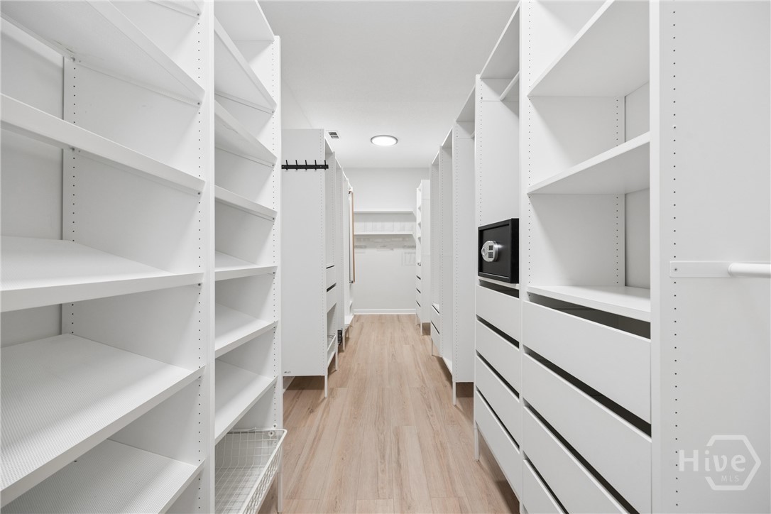 Master walk-in closet that goes on and on for days. The built in storage is a HUGE plus.