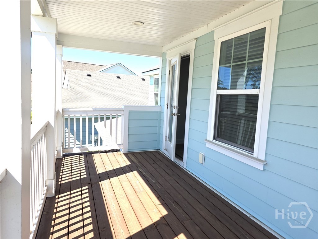 2nd Level Porch gives widespread view of Loblolly Lane.  It opens into huge 2nd level living area and 4 bedrooms, one of Heartwood's largest floorplans.