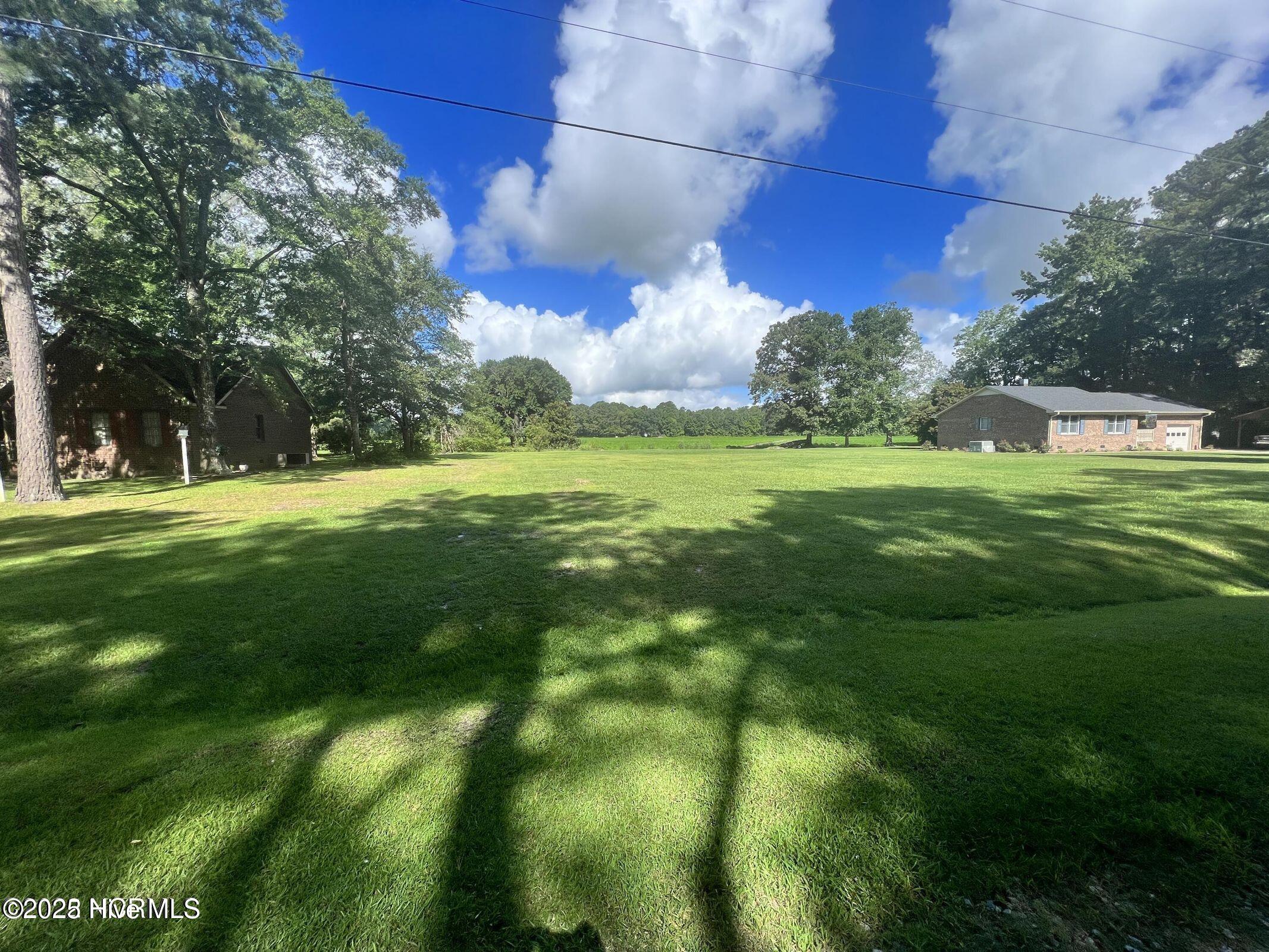 Picturesque residential lot in developed country subdivision. Private country setting.