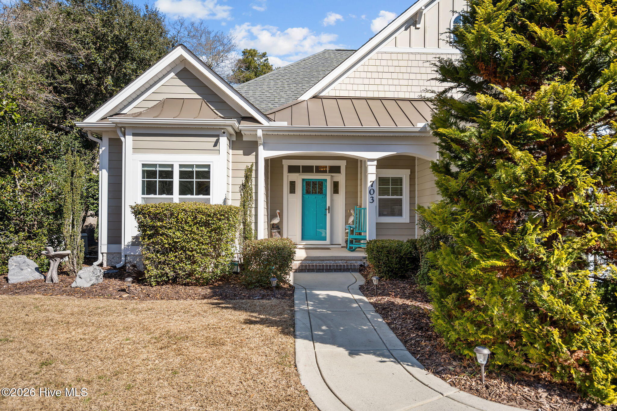703 Brown Pelican Lane, Hampstead, NC 28443 – photo 7: 63-web-or-mls-Photo Feb 12 2026, 11 49 3