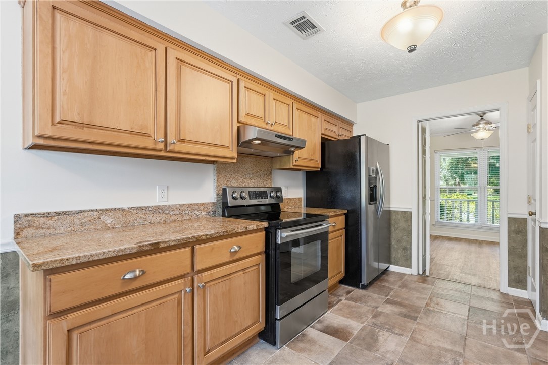 Lots of counter space, electric oven. Fridge remains with the property.