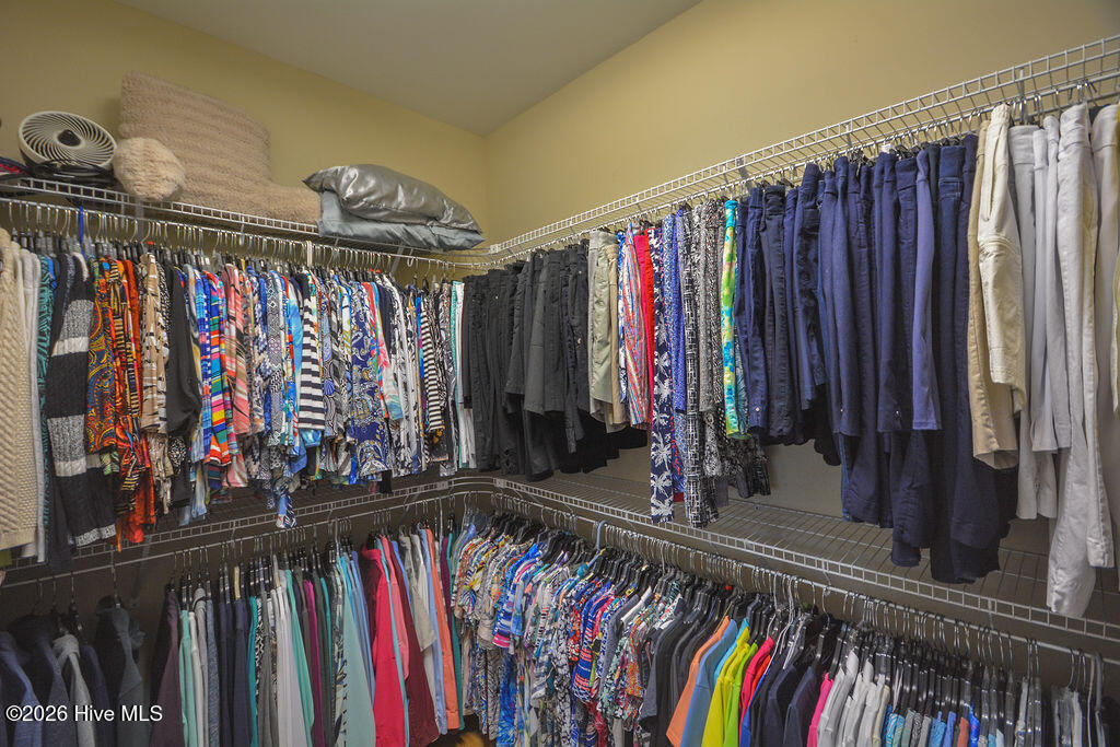 His & Hers Sep. Walk in closets