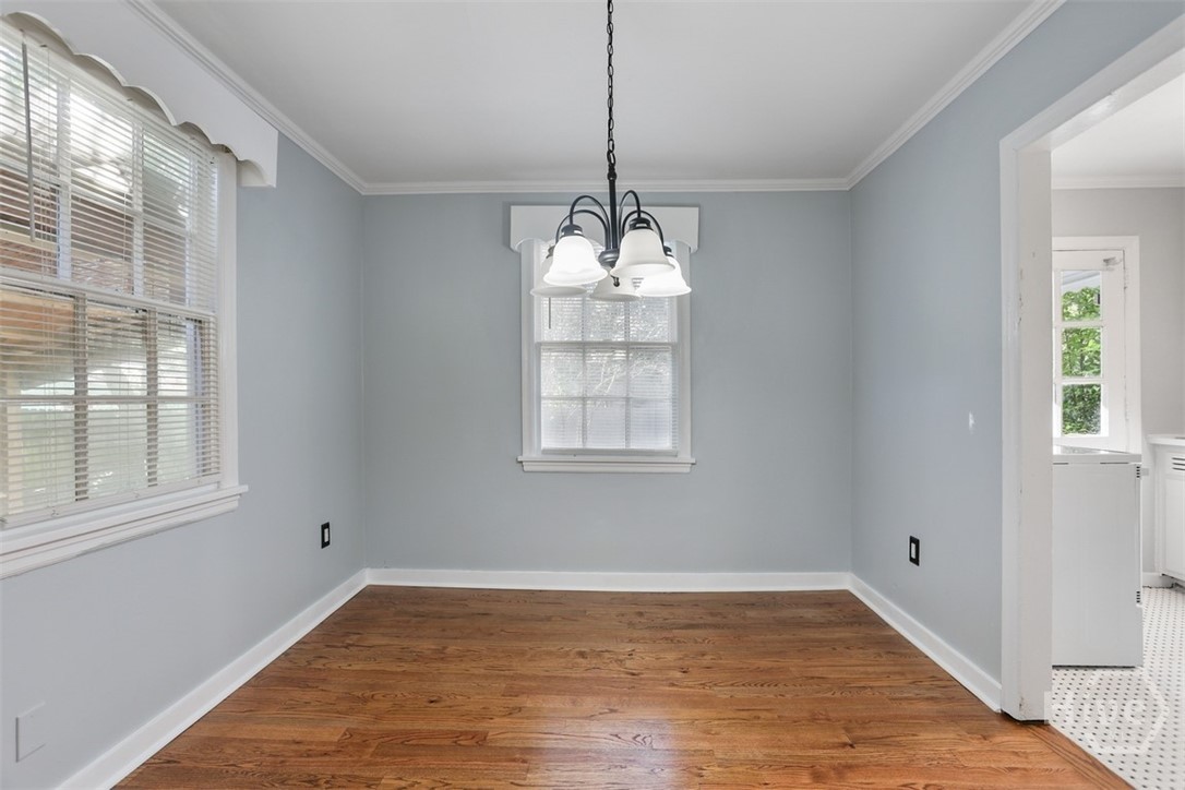 The dining room is adjacent to the kitchen.