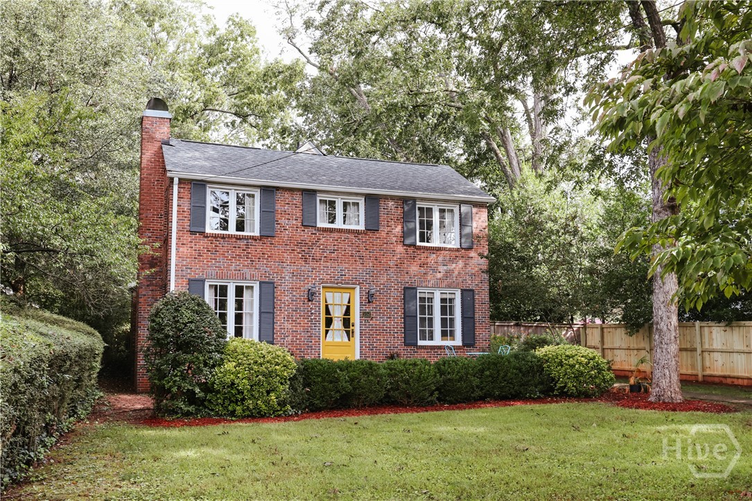Welcome to 552 Cobb Street, a distinguished residence nestled in the heart of Athens, Georgia's historic Cobbham neighborhood. This exquisite Georgian-style home, originally constructed in 1908 by renowned artist Lucy May Stanton, offers a harmonious blend of historic charm and modern convenience. With 2,452 square feet of thoughtfully designed living space, this property presents a unique opportunity for discerning buyers.

The home features four bedrooms and two and a half bathrooms, all upstairs. The updated kitchen is a testament to modern functionality, seamlessly integrating with the home's historic character. The home also features a large laundry area with space for a drop zone, adding to its practicality. Two staircases, one at the front and another at the rear, provide convenient access throughout the home. The living room is a highlight, boasting stunning, soaring windows and high ceilings that offer views of the private backyard. The rear of the property has complete alley access for off-street parking. 

Positioned high and set back from the street, the property affords beautiful views and a sense of privacy while still being integrated into the Cobbham community. The dual foyers, both front and rear, add to the home's welcoming ambiance. All mechanical systems, including wiring, plumbing, roof, and HVAC, have been updated. 

552 Cobb Street is more than just a home; it is a piece of Athens' rich history, offering a rare opportunity to own a property of significant heritage in a coveted location. This residence stands as a testament to timeless elegance and modern living.