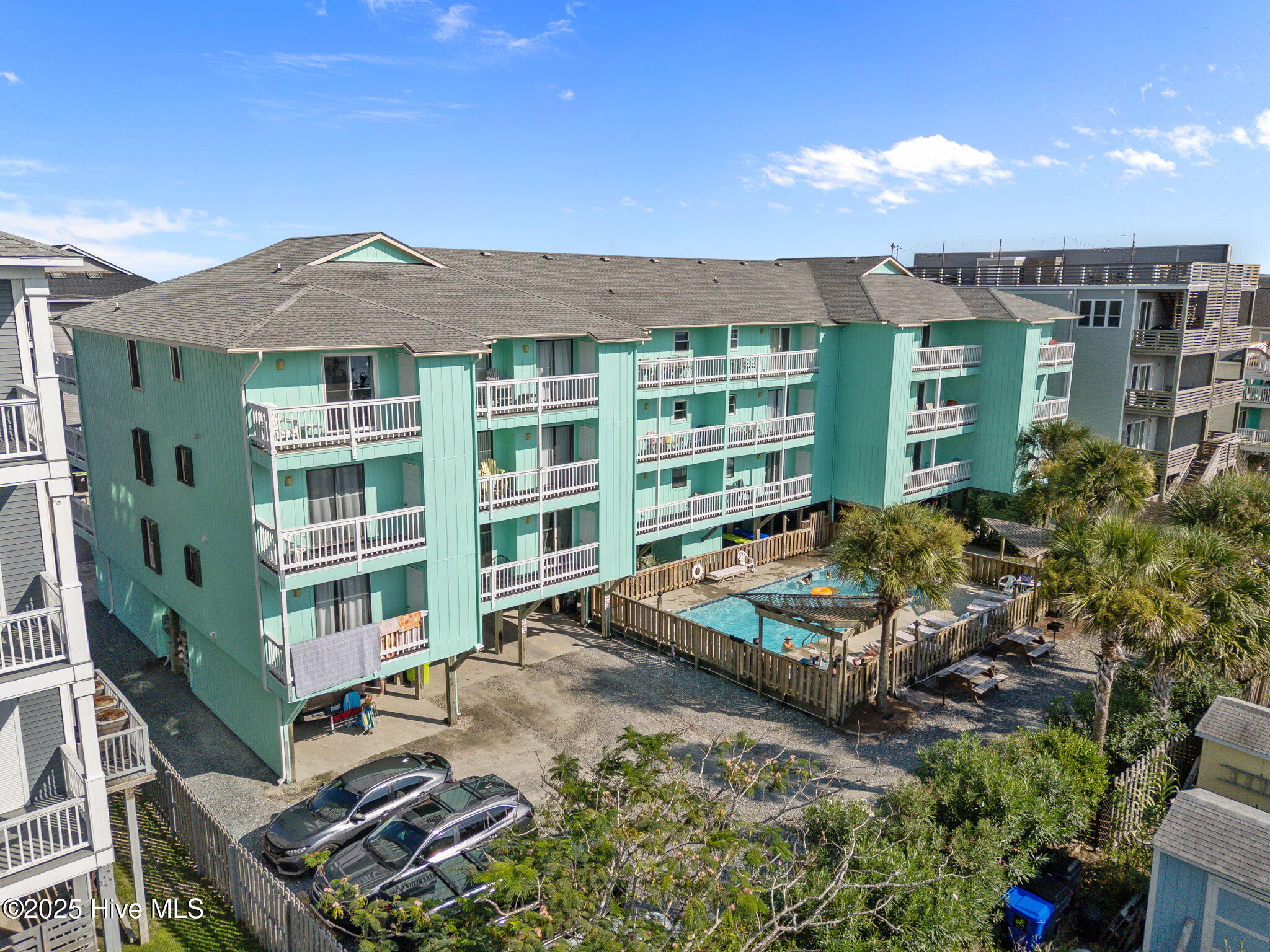 1013 Carolina Beach Avenue N 3h, Carolina Beach, NC 28428 – photo 4: 1-web-or-mls-DJI_20250819165551_0910_D