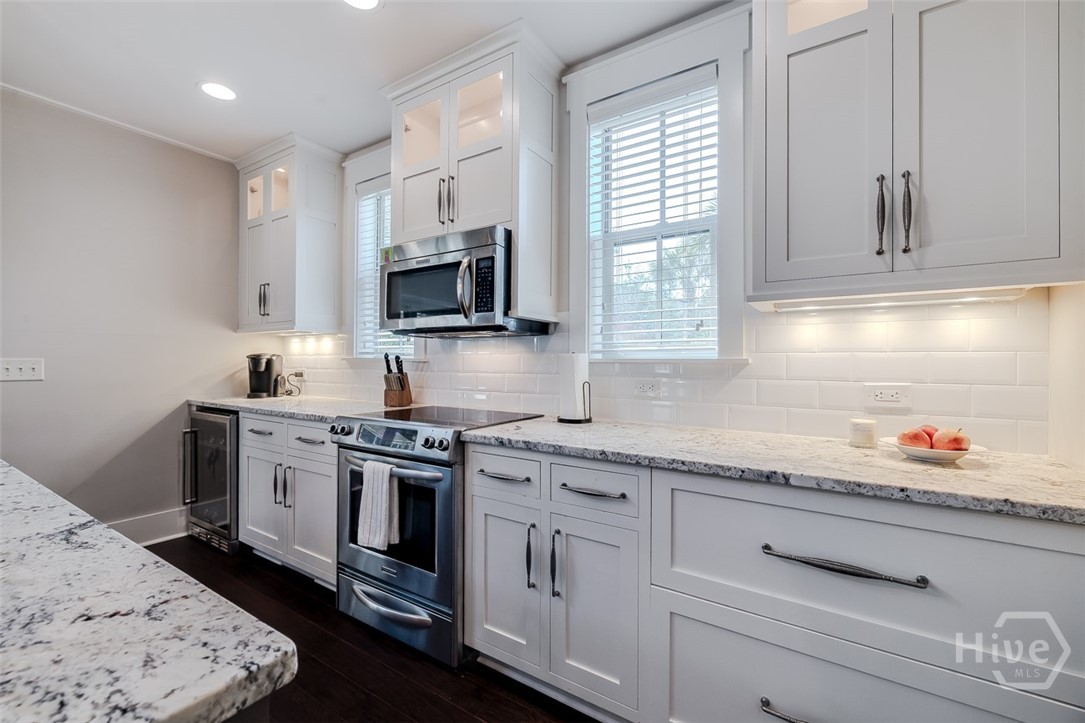 Wine cooler, microwave, oven/range, drawer fridge