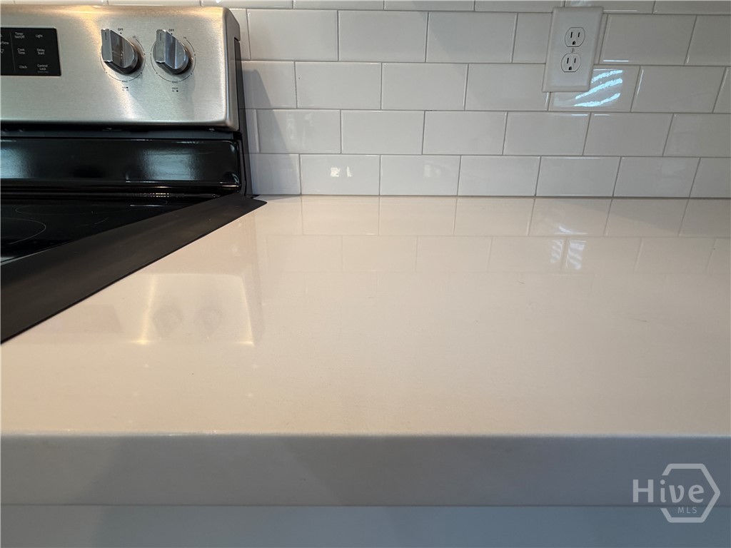 Kitchen - Quartz Counters & Subway Tile Backsplas