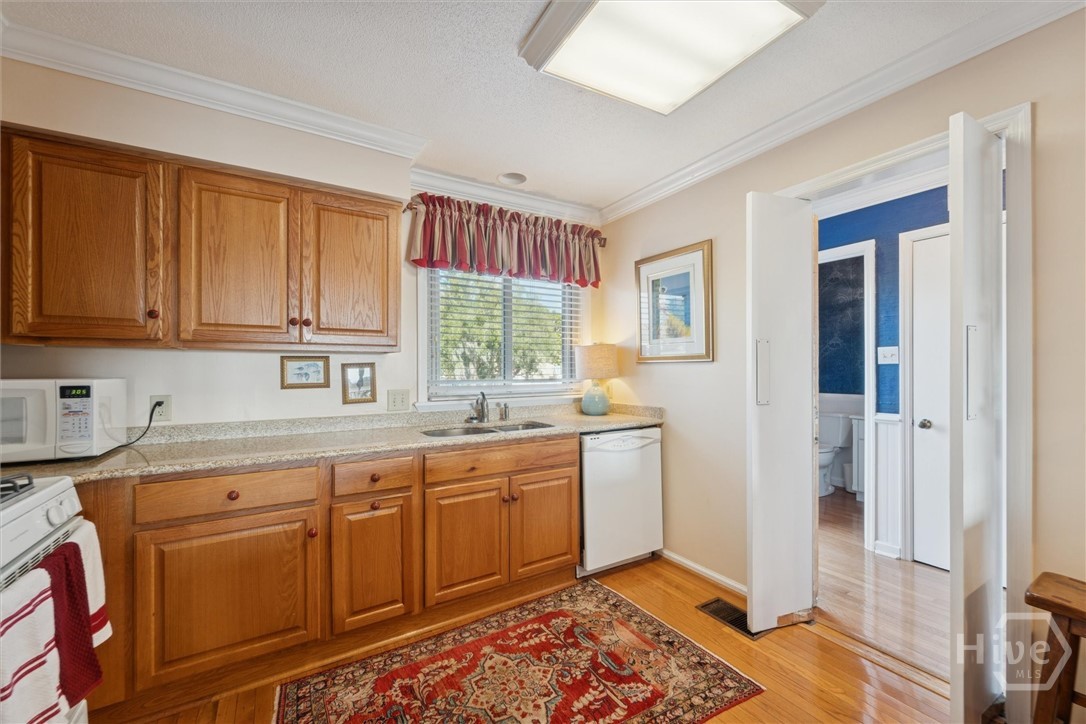 The kitchen faces the front of the home and is on the right off the foyer as you enter.