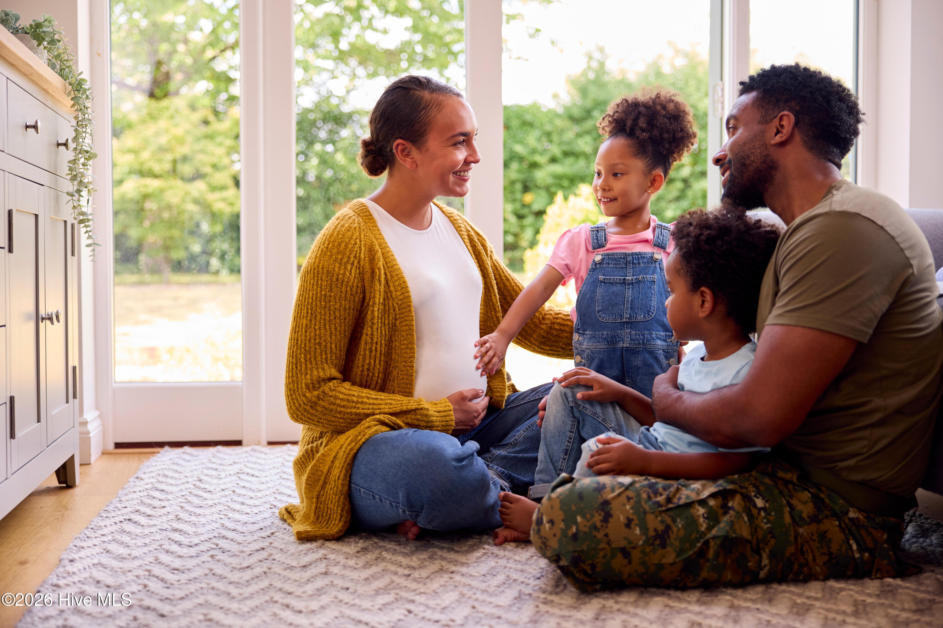 Mixed Race Military Family in Bedroom