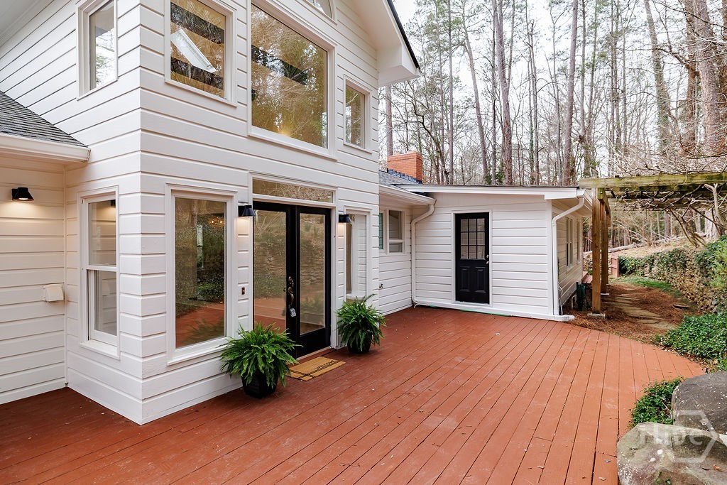 Private rear deck overlooking koi pond