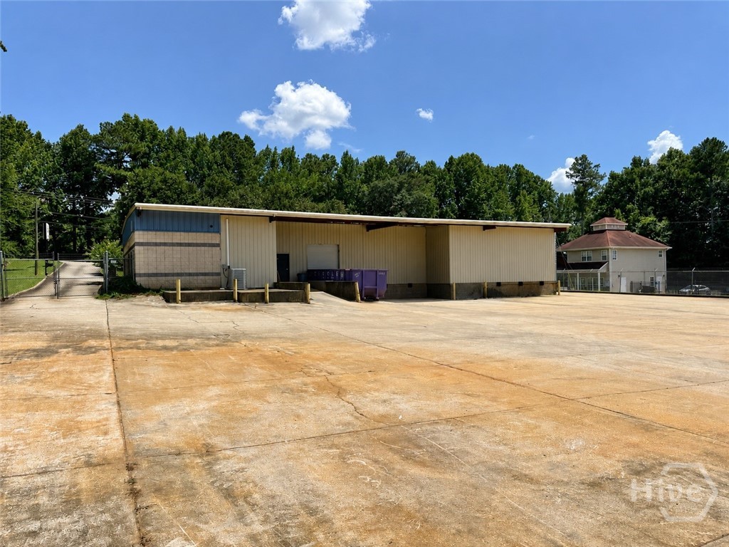 Rear yard and covered loading dock, 255 Collins In