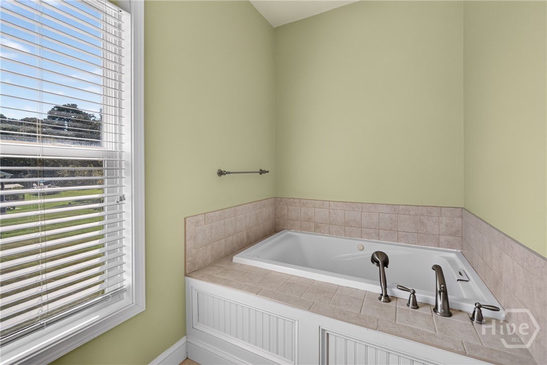 Master bathroom with separate soaking tub