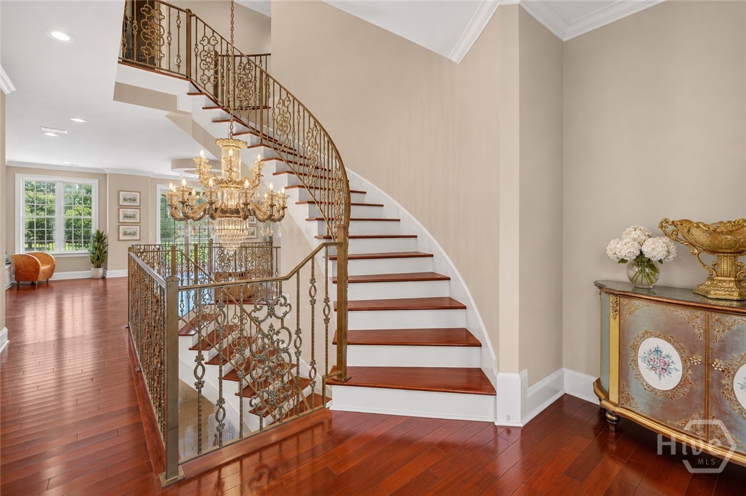 On 2nd floor, staircase to 3rd floor. Balcony overlooking driveway directly opposite.