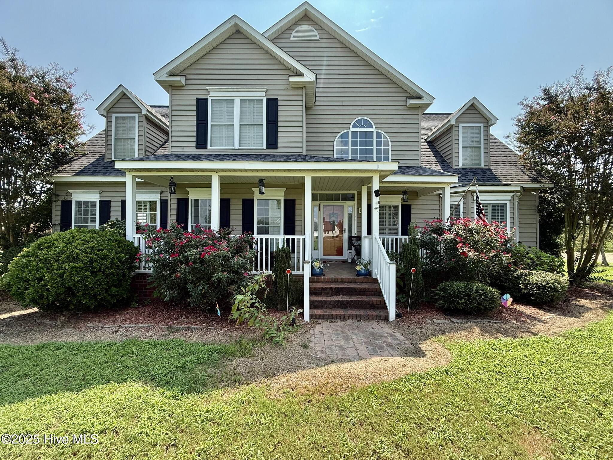Have you ever wanted to own an estate?  This is your chance.  Away from the hustle and bustle of the city this 3.7 acre property  is bursting with amenities.  The entrance has an inviting foyer  leading into a large family room with a cozy gas fireplace.  All appliances in the kitchen are only two years new.  The kitchen bar is perfect for visiting the cook or watching the homework being completed.  The primary bedroom and bath are located on the first floor.  There is also an office and powder room.   Enjoy your morning coffee on the rear deck or screen porch.  The second floor exhibits four nice size bedrooms and a full bathroom.  Moving on there is a detached mini house with a large covered porch and deck.  This is perfect for entertaining.  This space has a full kitchen, laundry area and full bathroom.  The loft is an additional sleeping area for your guests. The detached garage has a workshop.  So much more....fruit trees including pear, apples, blackberries and grapes.  A castle is already in place for the play area.  There are pens in place for animals, chickens, goats, dog etc.  Don't miss your chance to view this wonderful property and fall in love with your new home.
Recent improvements include new roofs on both buildings in 2024, new water heaters in both buildings, some new windows, all new appliances in both the home and the barn house.  Be sure to view the photos.
Hobgood-15 miles, Tarboro-20 miles, Williamston-20 miles and Greenville-25 miles