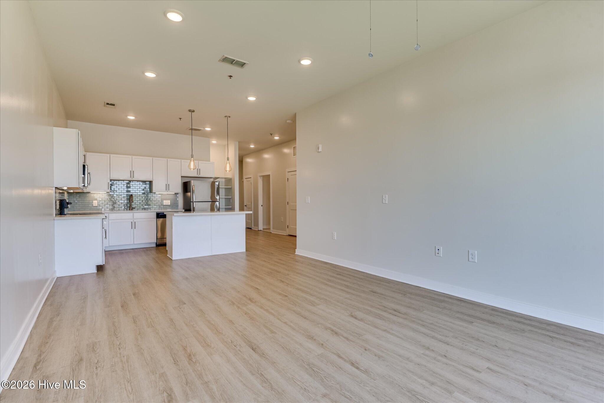 Living area to the kitchen