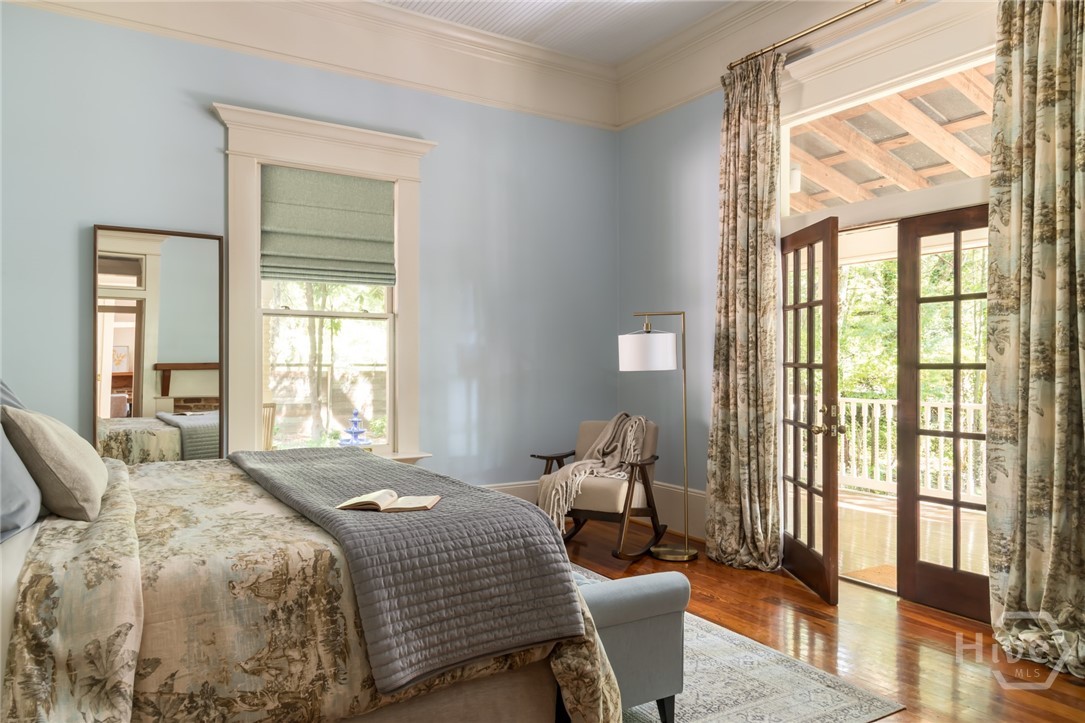 Front bedroom view to the french doors and porch.