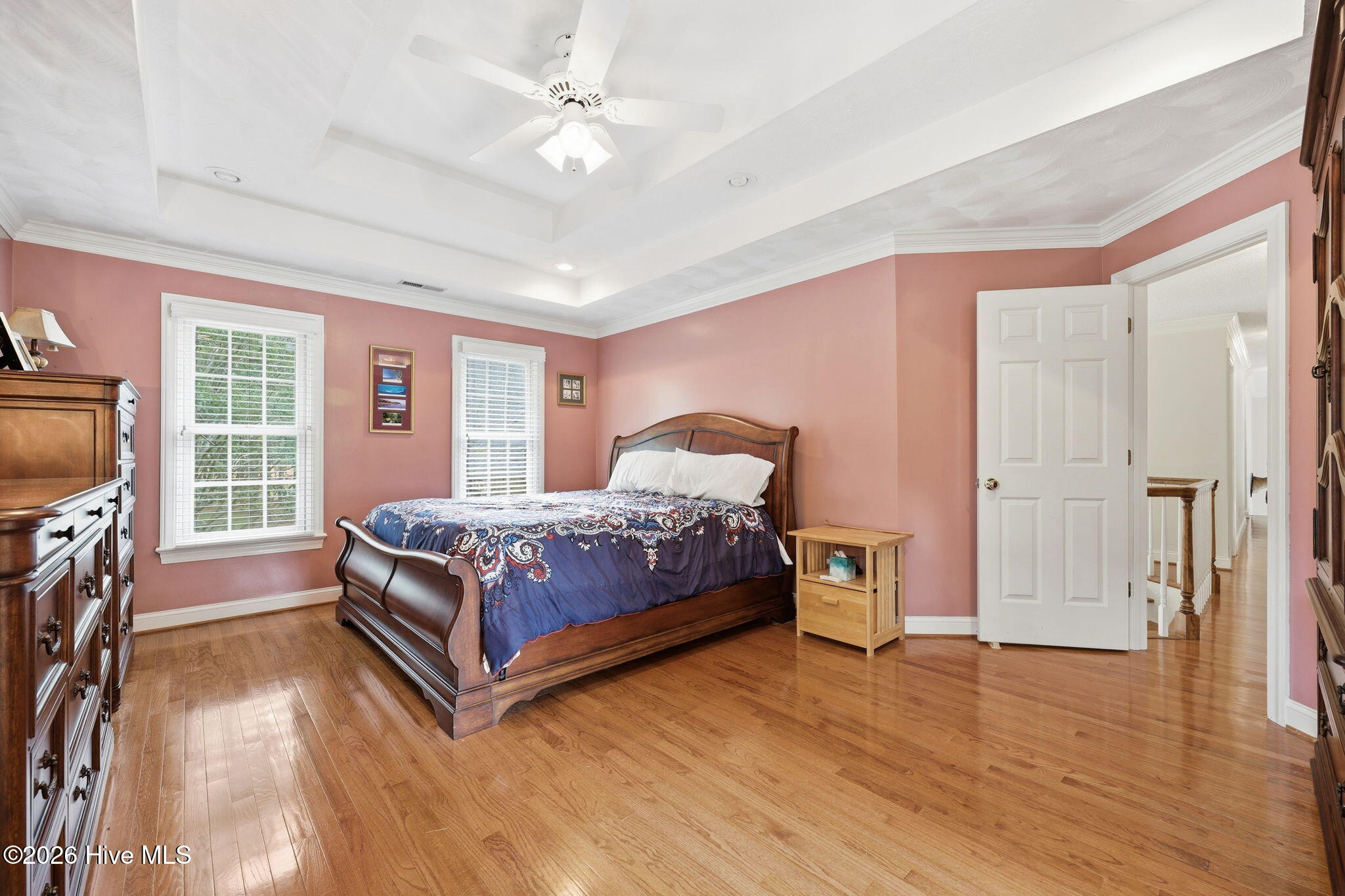 upstairs : Owner retreat is very large with wood flooring