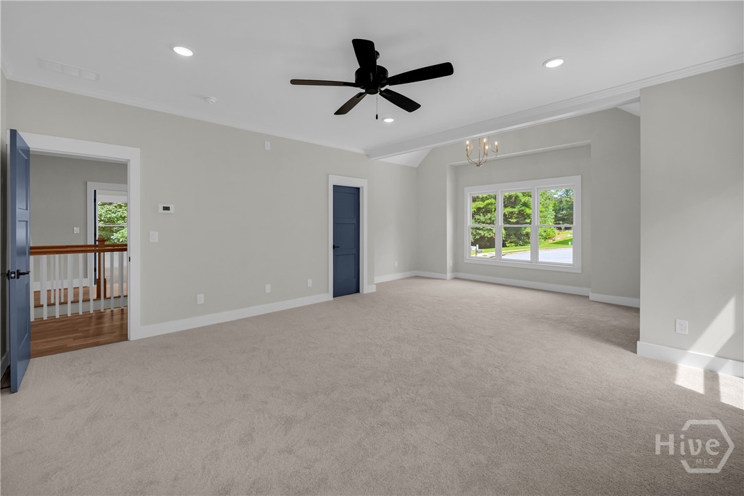 The spectacular owner’s retreat is a destination of its own, complete with a designer accent wall, private sitting area, pocket doors leading to a spa-inspired bath, and a unique secret passageway that adds a touch of charm and character you won’t find elsewhere.