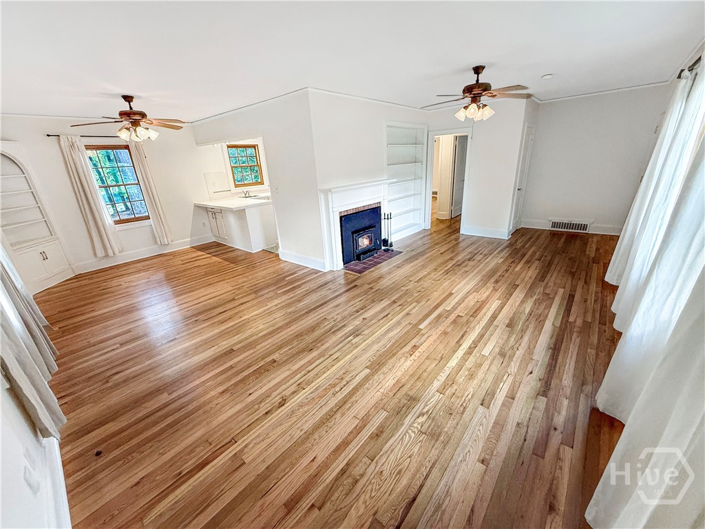 Great Room w/Fireplace and Refinished Hardwoods