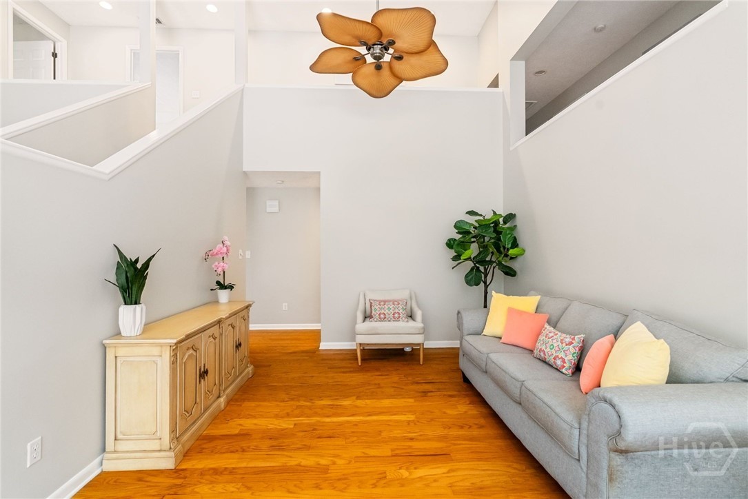 Open Concept Oversized Living Room Features Vaulte