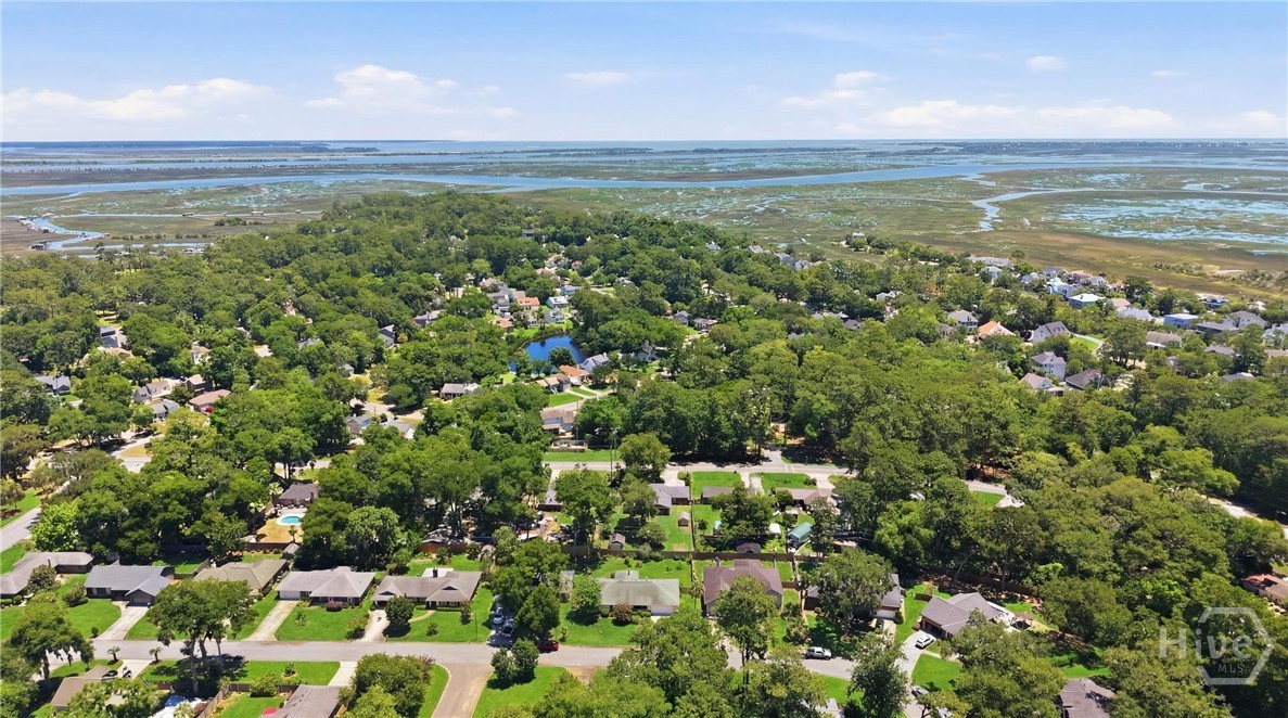 Aerial view shows how close you are to the marsh and Savannah river, yet the dwelling is in an X flood zone and flood insurance is not required.